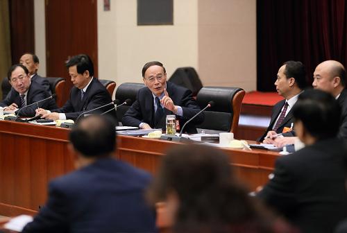 3月9日,中共中央政治局常委王岐山参加十二届全国人大一次会议黑龙江代表团的审议。新华社记者 兰红光 摄