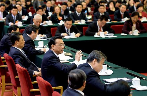 3月9日,中共中央政治局常委、国务院副总理李克强参加十二届全国人大一次会议河南代表团的审议。新华社记者 刘建生 摄